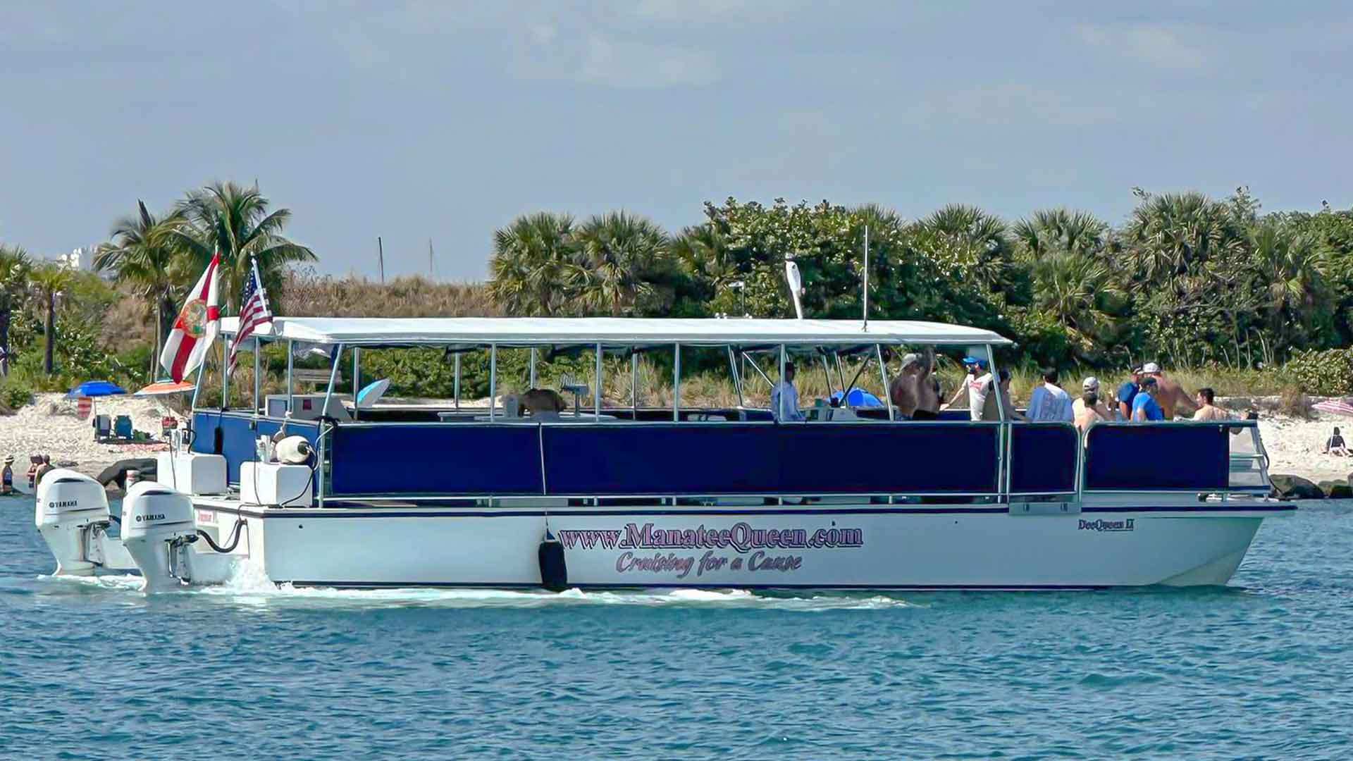 Manatee Queen cruising along the shore
